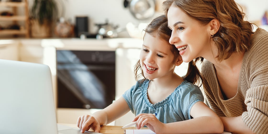Mother encouraging her child to learn.