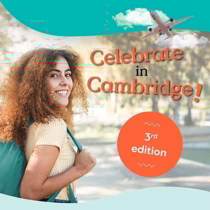 Smiling young girl with curly hair and a green bagpack