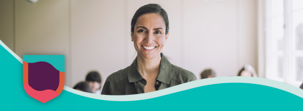 Smiling teacher in a classroom