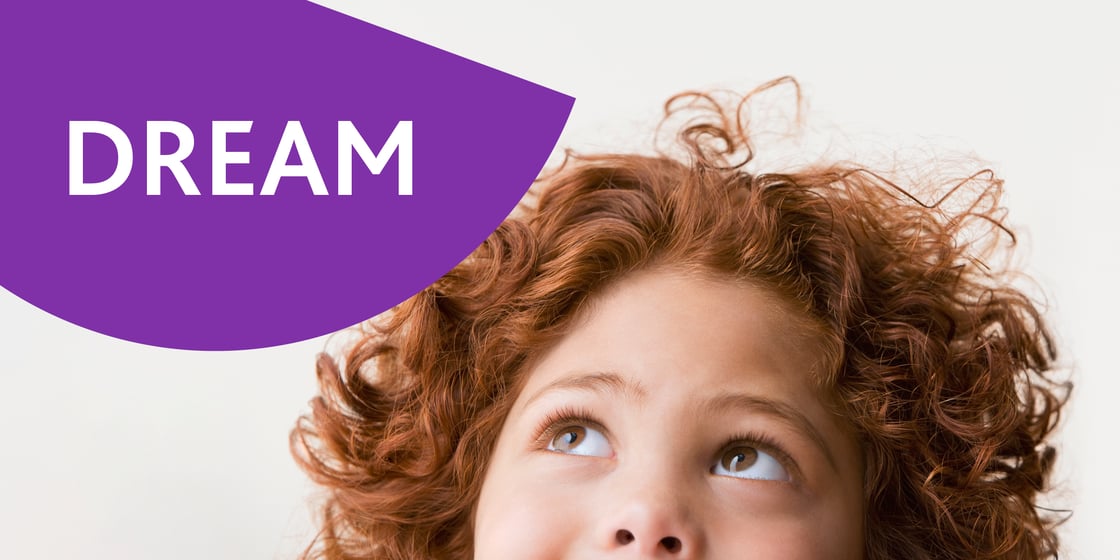 Child with the word 'Dream' above their head.