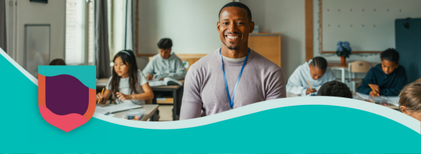 Smiling Teacher in front of a classroom of child students