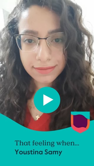 A young female teacher with dark curly hair and glasses smiles behind the Cambridge shield. Text: That feeling when ... Youstina Samy